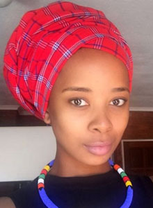 zama in traditional maasai shuka headscarf, doek